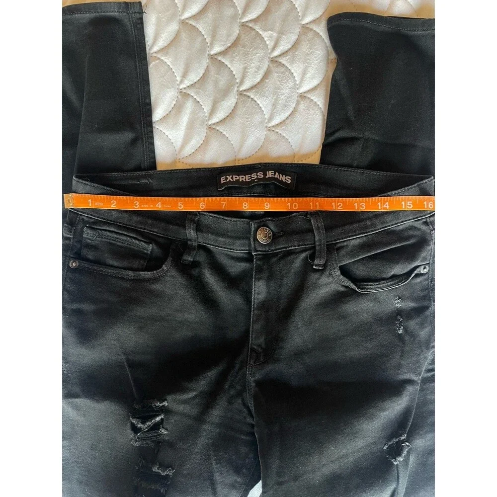 Express Women’s Black Jeans Size 12 Mid Rise Legging Distressed Stretch